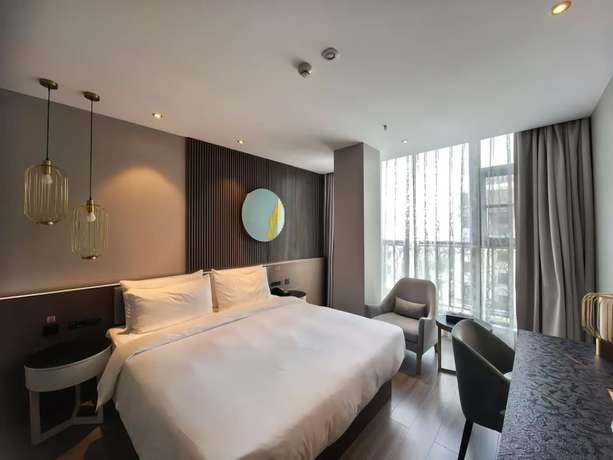 Imagen de la habitación del Hotel Crystal Hotel Shanghai Wujiaochang. Foto 2