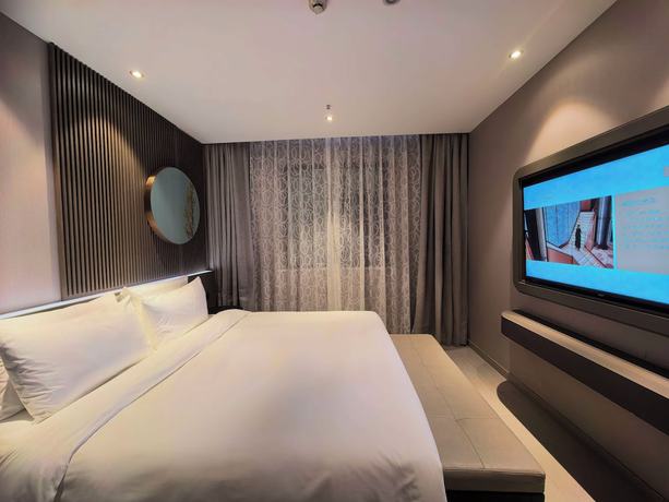 Imagen de la habitación del Hotel Crystal Hotel Shanghai Wujiaochang. Foto 6