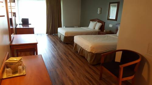 Imagen de la habitación del Hotel Crystal Inn Neptune. Foto 10