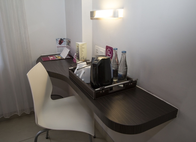 Imagen de la habitación del Hotel Crystal Kuta. Foto 11