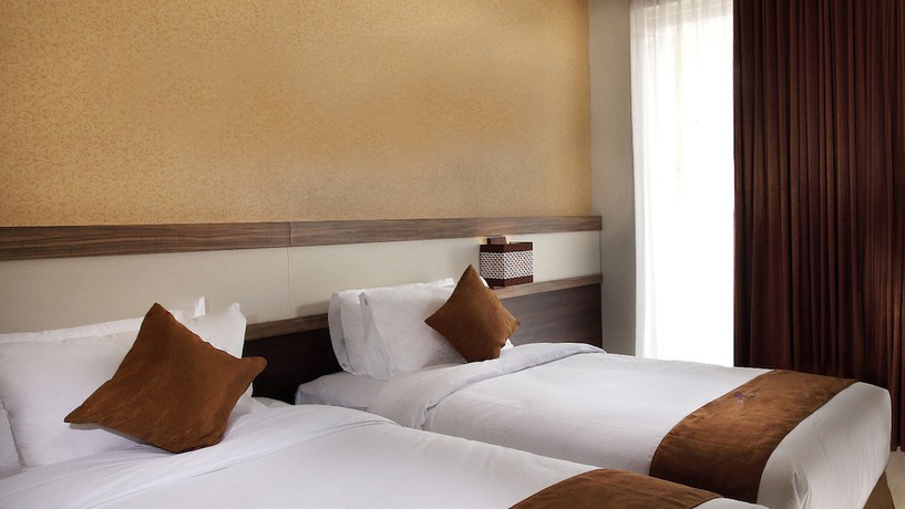 Imagen de la habitación del Hotel Crystal Lotus Yogyakarta. Foto 3