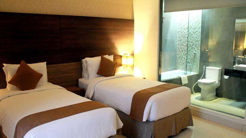 Imagen de la habitación del Hotel Crystal Lotus Yogyakarta. Foto 9