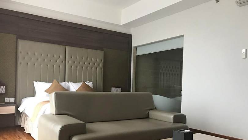 Imagen de la habitación del Hotel Crystal Lotus Yogyakarta. Foto 11