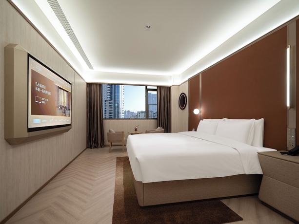 Imagen de la habitación del Hotel Crystal Orange Qingdao May Fourth Square. Foto 2