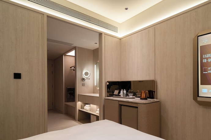 Imagen de la habitación del Hotel Crystal Orange Qingdao May Fourth Square. Foto 9
