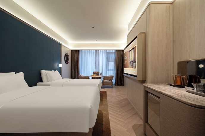 Imagen de la habitación del Hotel Crystal Orange Qingdao May Fourth Square. Foto 12