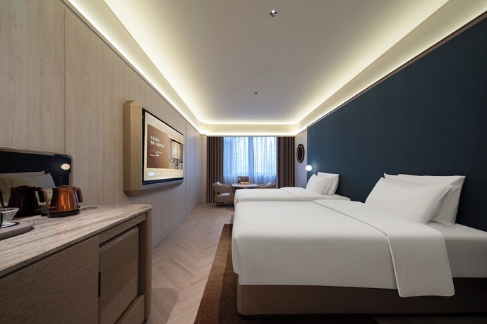 Imagen de la habitación del Hotel Crystal Orange Qingdao May Fourth Square. Foto 14