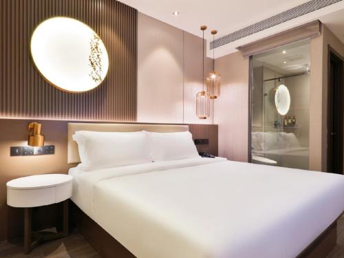 Imagen de la habitación del Hotel Crystal Orange - Shanghai The Bund Jinling East Road. Foto 16