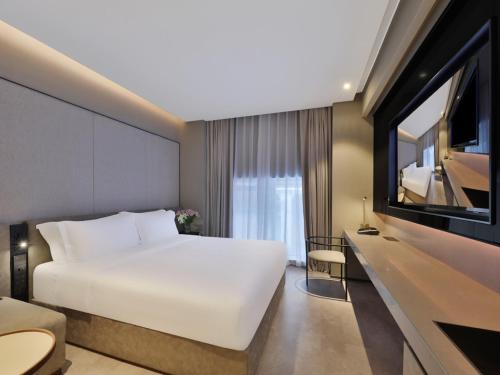 Imagen de la habitación del Hotel Crystal Orange - Shanghai The Bund Jinling East Road. Foto 19