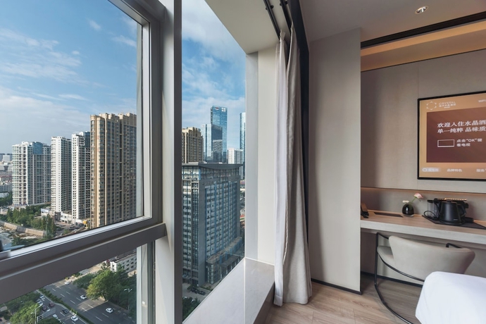 Imagen de la habitación del Hotel Crystal Qingdao MixC Shandong Road. Foto 4