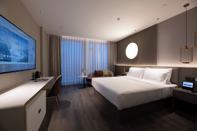 Imagen de la habitación del Hotel Crystal Qingdao MixC Shandong Road. Foto 7