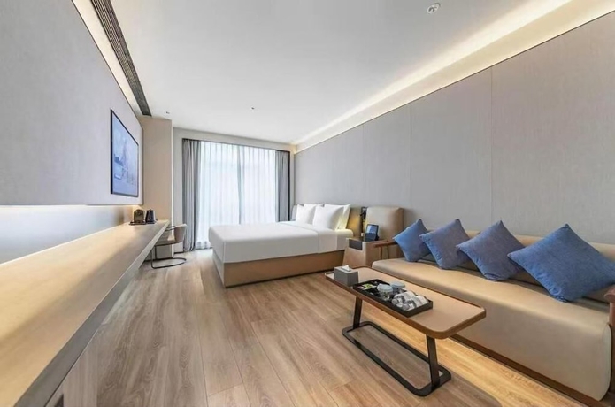 Imagen de la habitación del Hotel Crystal Qingdao MixC Shandong Road. Foto 9