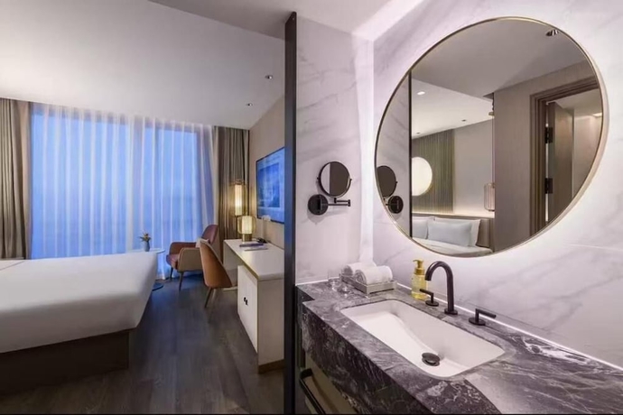 Imagen de la habitación del Hotel Crystal Qingdao MixC Shandong Road. Foto 11