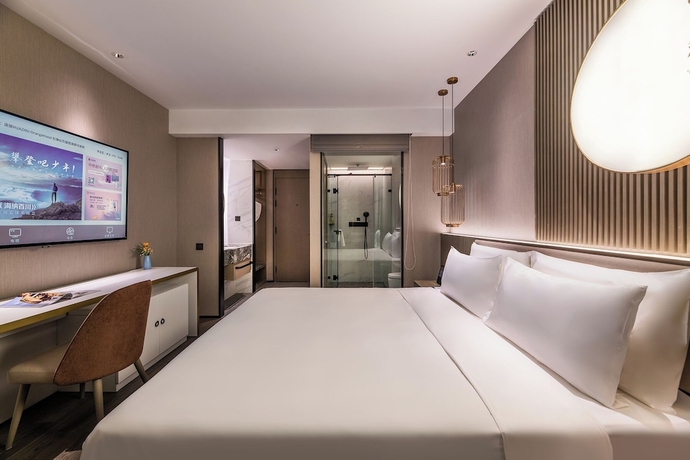 Imagen de la habitación del Hotel Crystal Qingdao MixC Shandong Road. Foto 12