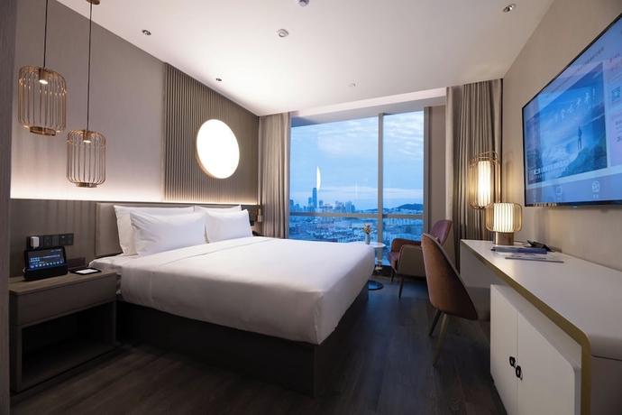 Imagen de la habitación del Hotel Crystal Qingdao MixC Shandong Road. Foto 13