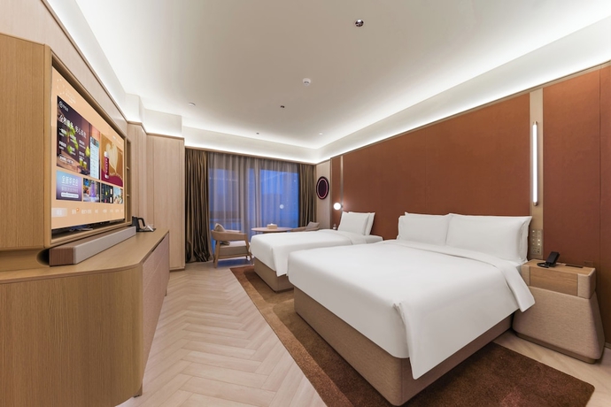 Imagen de la habitación del Hotel Crystal Qingdao Taidong St.. Foto 2