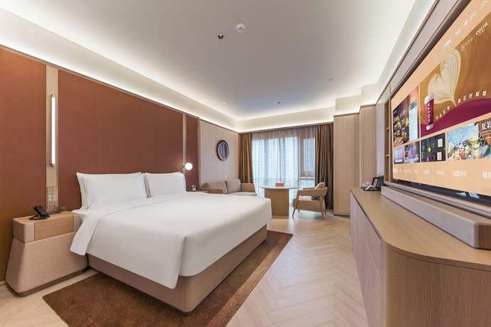 Imagen de la habitación del Hotel Crystal Qingdao Taidong St.. Foto 4