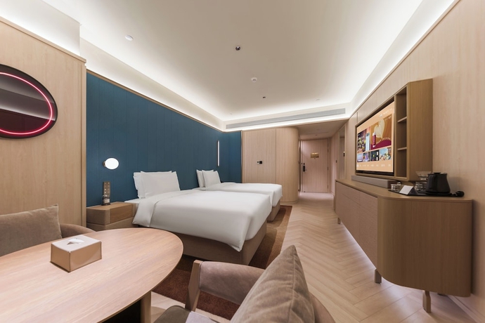 Imagen de la habitación del Hotel Crystal Qingdao Taidong St.. Foto 7