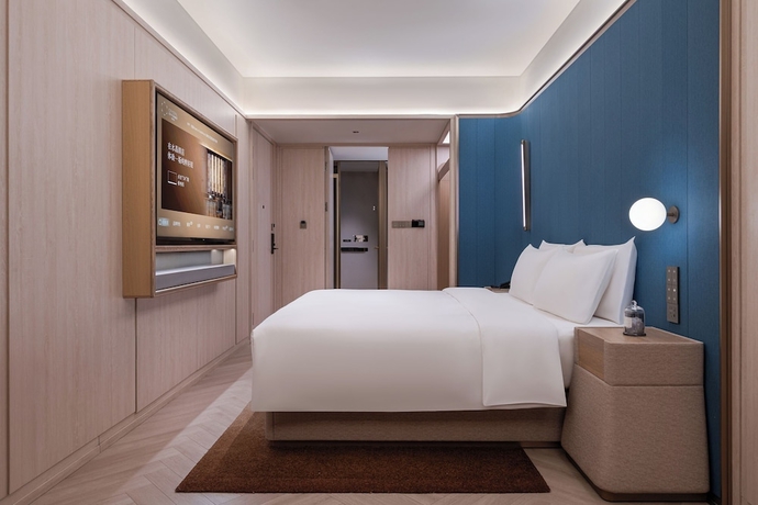 Imagen de la habitación del Hotel Crystal Qingdao Taidong St.. Foto 8