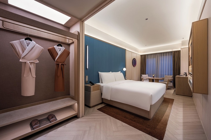 Imagen de la habitación del Hotel Crystal Qingdao Taidong St.. Foto 9