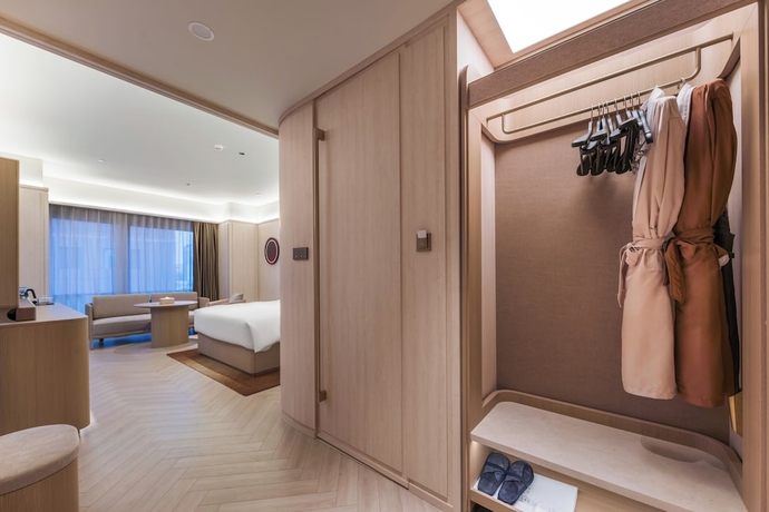 Imagen de la habitación del Hotel Crystal Qingdao Taidong St.. Foto 12