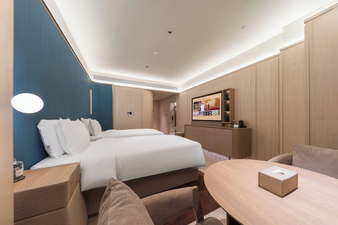 Imagen de la habitación del Hotel Crystal Qingdao Taidong St.. Foto 13