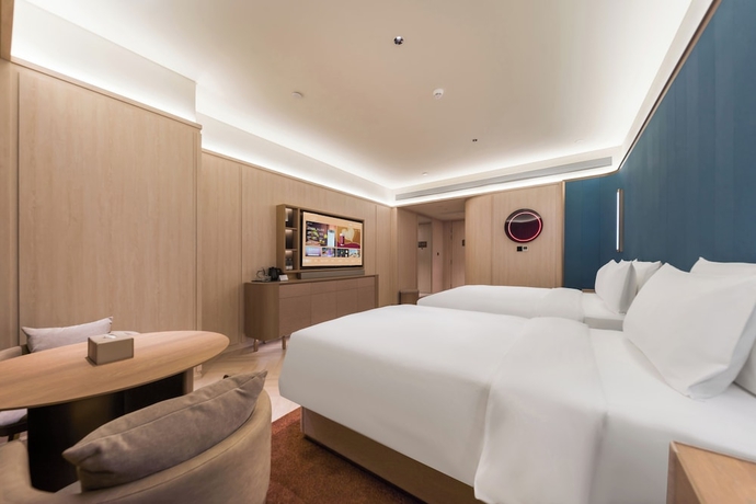 Imagen de la habitación del Hotel Crystal Qingdao Taidong St.. Foto 14