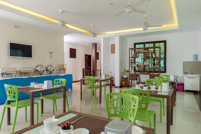 Imagen del bar/restaurante del Hotel Crystal Sands Villa. Foto 3