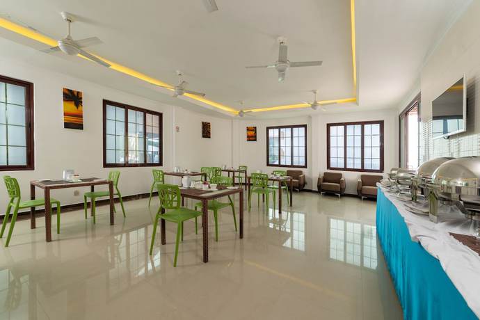 Imagen del bar/restaurante del Hotel Crystal Sands Villa. Foto 4