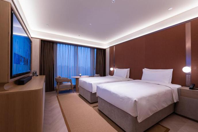 Imagen de la habitación del Hotel Crystal Shanghai Changfeng Business District. Foto 6