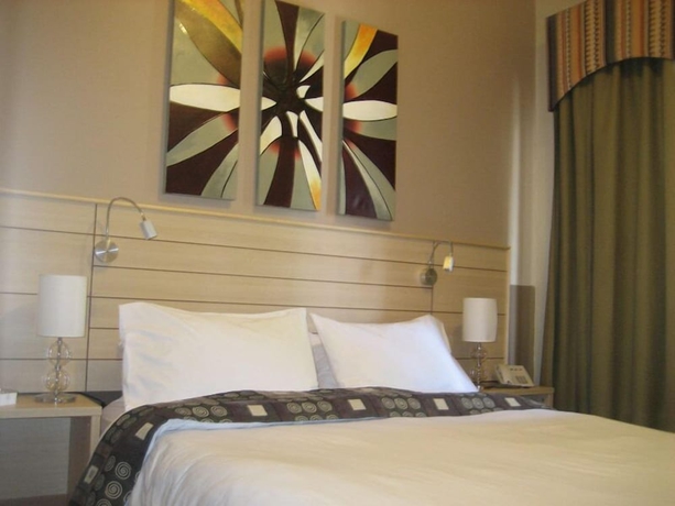 Imagen de la habitación del Hotel Crystal Suites. Foto 8