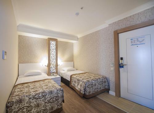 Imagen de la habitación del Hotel Crystal Sunset Pearl Collection. Foto 5