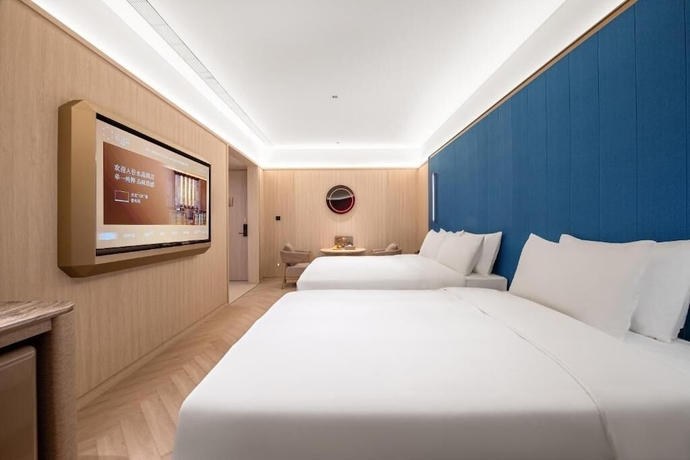 Imagen de la habitación del Hotel Crystal Weihai Happiness Gate. Foto 9