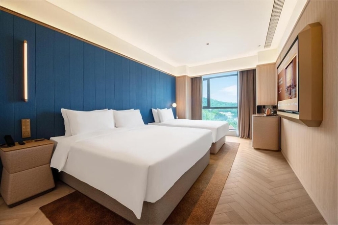 Imagen de la habitación del Hotel Crystal Weihai Happiness Gate. Foto 10
