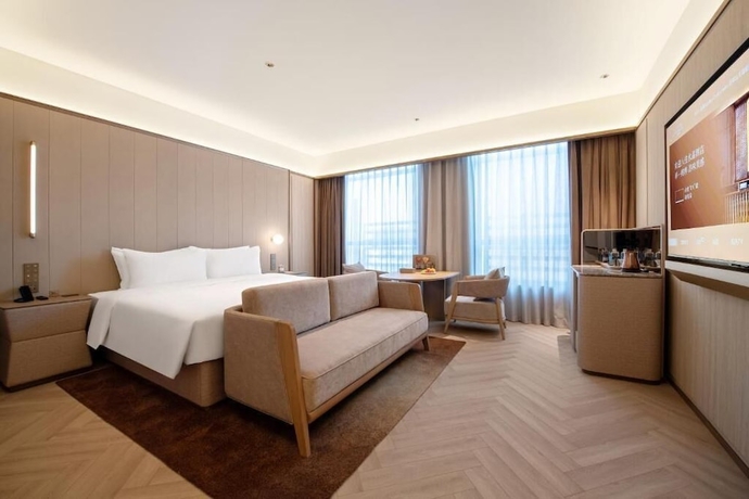 Imagen de la habitación del Hotel Crystal Weihai Happiness Gate. Foto 12