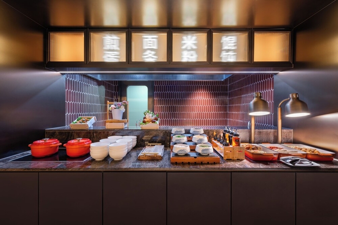 Imagen del bar/restaurante del Hotel Crystal Wusi Square Wheat Island. Foto 6