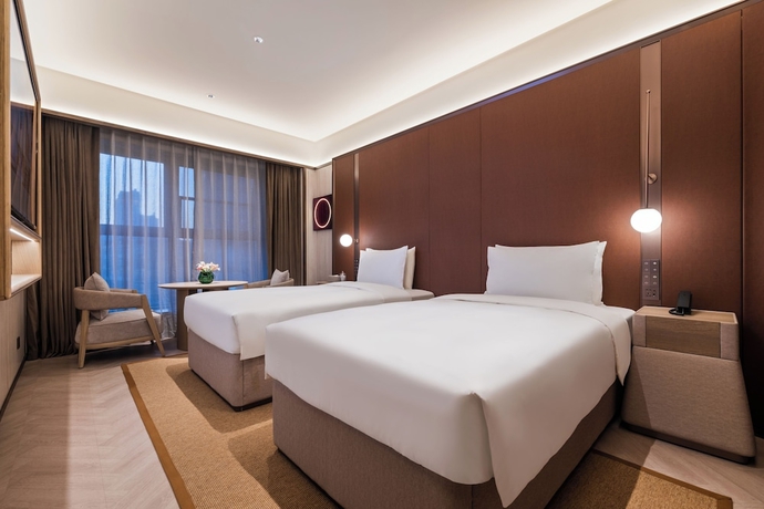 Imagen de la habitación del Hotel Crystal Yantai Binhai Square. Foto 2