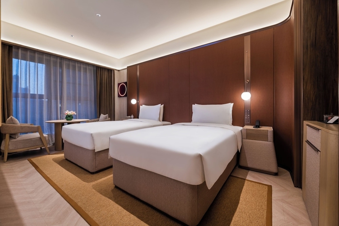 Imagen de la habitación del Hotel Crystal Yantai Binhai Square. Foto 3