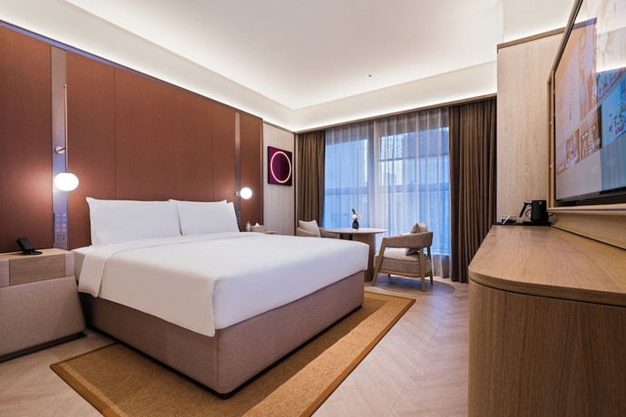 Imagen de la habitación del Hotel Crystal Yantai Binhai Square. Foto 4