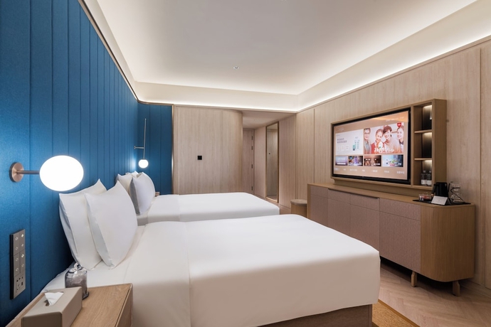 Imagen de la habitación del Hotel Crystal Yantai Binhai Square. Foto 6