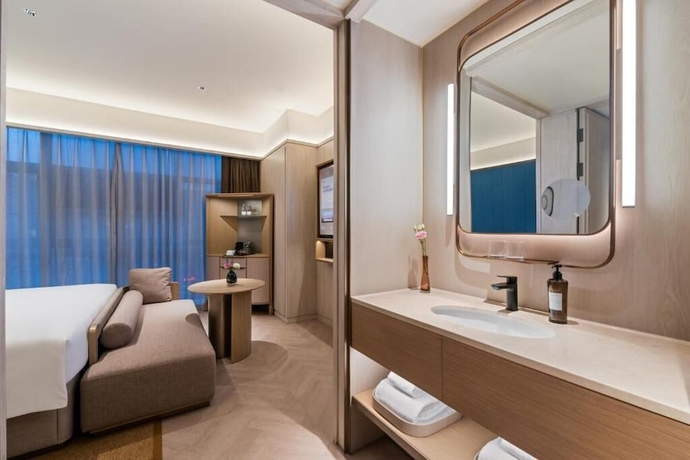 Imagen de la habitación del Hotel Crystal Yantai Binhai Square. Foto 11