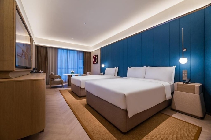 Imagen de la habitación del Hotel Crystal Yantai Binhai Square. Foto 12