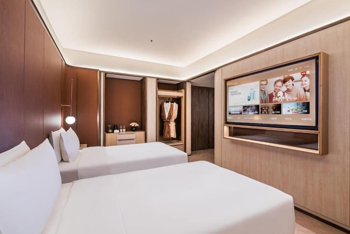 Imagen de la habitación del Hotel Crystal Yantai Binhai Square. Foto 14