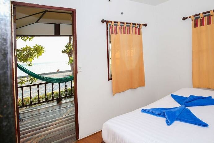Imagen de la habitación del Hotel Crystal white sand resort. Foto 11