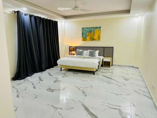Imagen de la habitación del Hotel Cterra Dodoma Luxury Suites. Foto 20