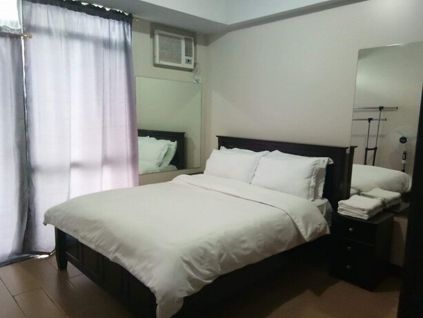Imagen de la habitación del Hotel Cubao ManhattanHeights Unit 4Q Tower D. Foto 27