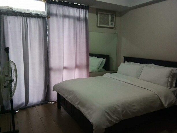 Imagen de la habitación del Hotel Cubao ManhattanHeights Unit 4Q Tower D. Foto 31