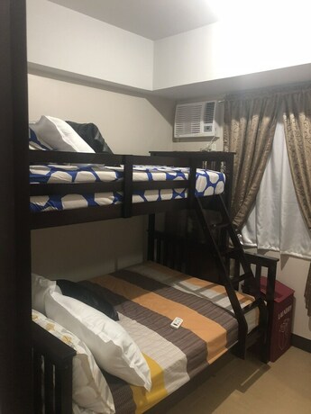 Imagen de la habitación del Hotel Cubao ManhattanHeights Unit 4Q Tower D. Foto 32