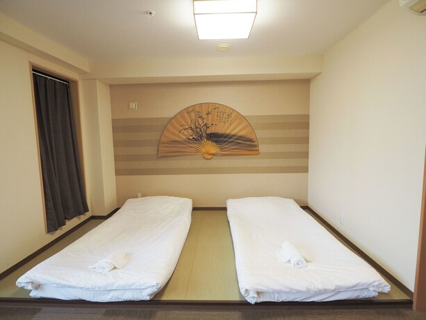 Imagen de la habitación del Hotel Cube, Osaka. Foto 25