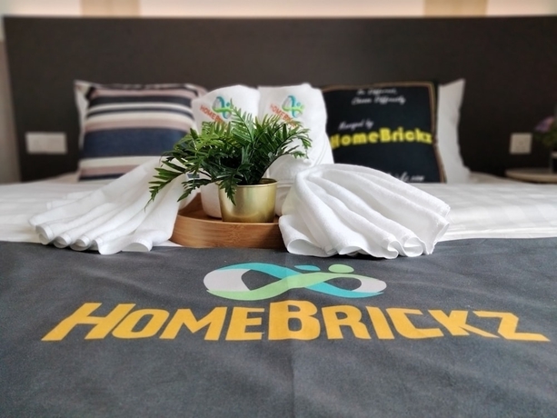 Imagen de la habitación del Hotel Cubic Botanical Suites Homebrickz. Foto 3